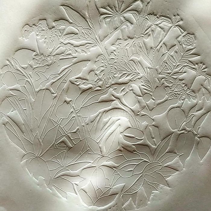 Gravure sur bois et gaufrage