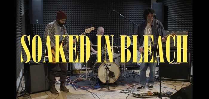SOAKED IN BLEACH