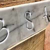 Atelier démonstration calligraphie et gravure sur pierre